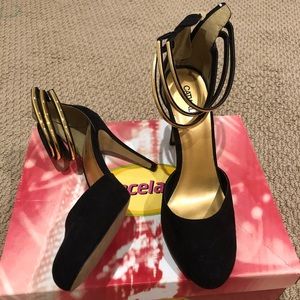 Black and gold pumps